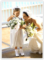 Beautiful bride with flowergirl