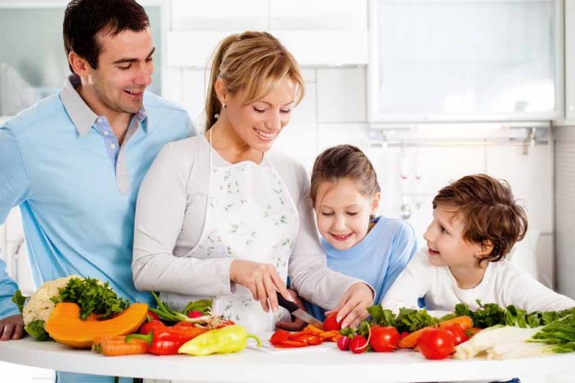 Happy family preparing a healthy food dinner