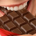 woman-eating-chocolate-bar