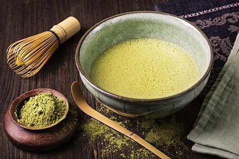 Preparing Matcha green tea - powder+Bamboo whisk+bowl of green tee+spoon